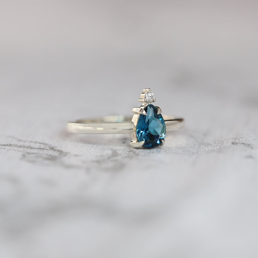 Eva Queen Pear London Blue Topaz Ring with Moissanite