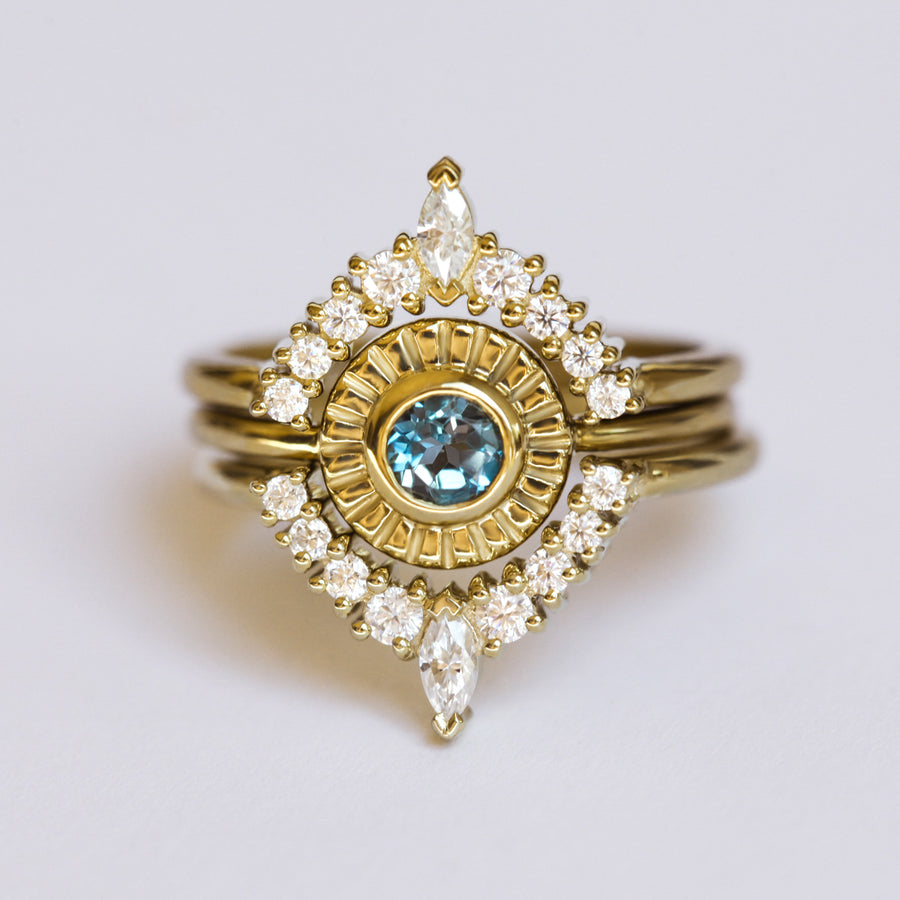 Sunset Ring set with London Blue Topaz and Moissanite
