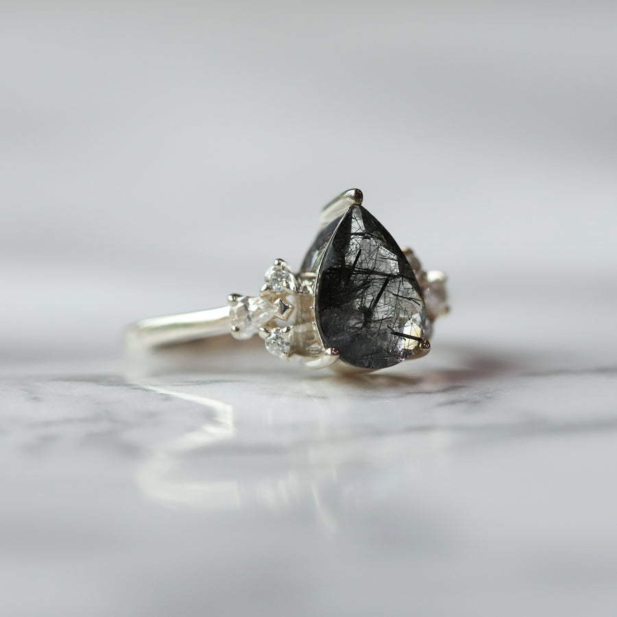 Aretha Pear Black Rutile Ring with Round Moissanite