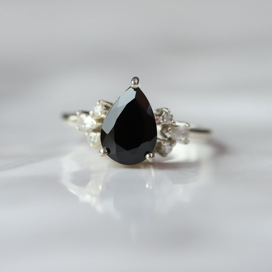 Aretha Pear Black Spinel Ring with Round Moissanite