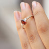 Sienna Pear Garnet Ring with side Moissanite