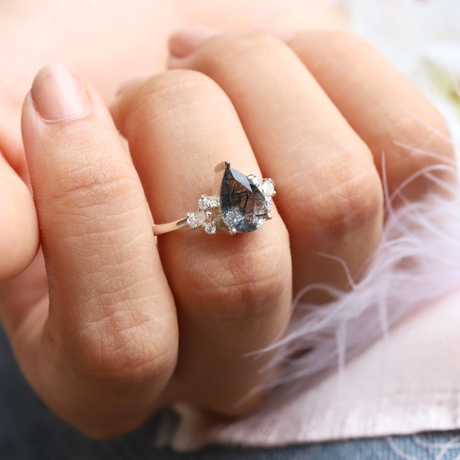 Aretha Pear Black Rutile Ring with Round Moissanite