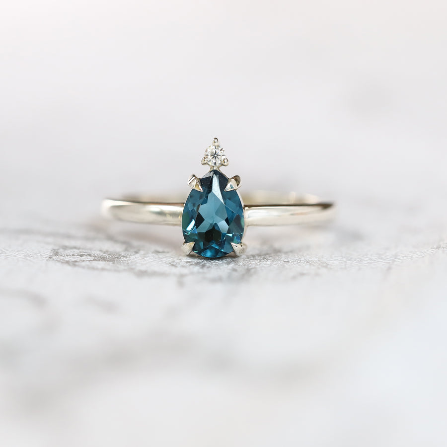 Eva Queen Pear London Blue Topaz Ring with Moissanite