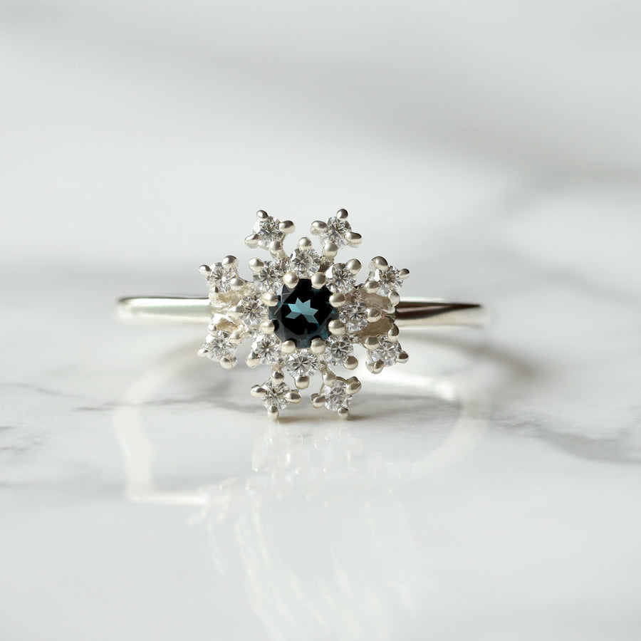 Clare London Blue Topaz Ring with side Moissanite