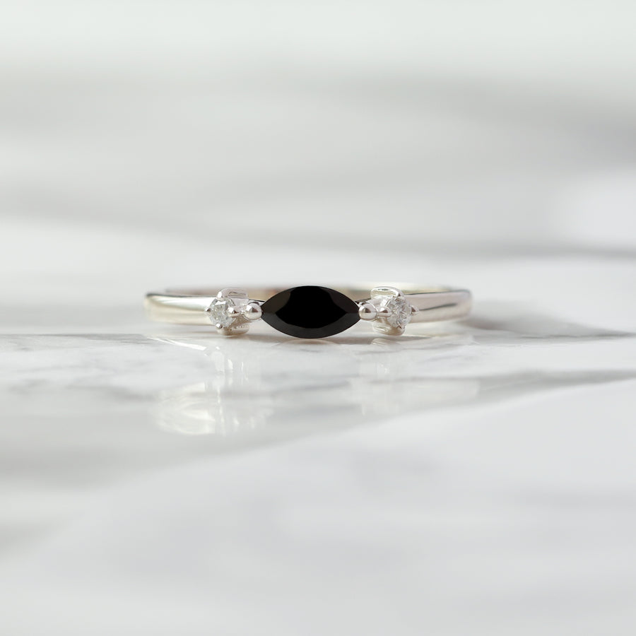 Giotto Black Spinel with side Moissanite Ring