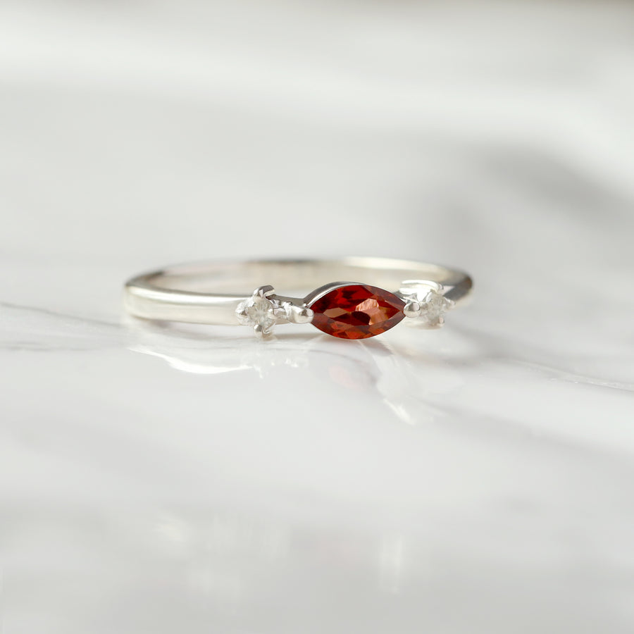 Giotto Garnet Ring with side Moissanites Ring