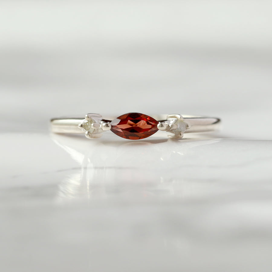 Giotto Garnet Ring with side Moissanites Ring