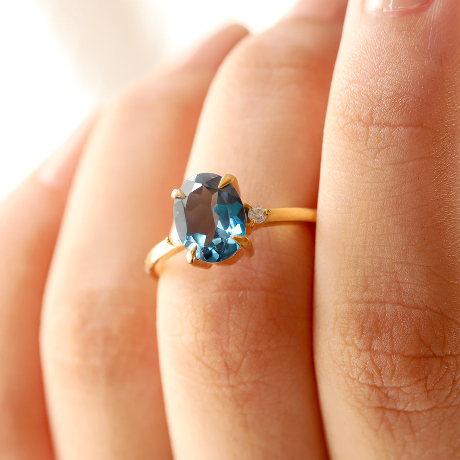 Taylor Oval London Blue Topaz Ring with Moissanite