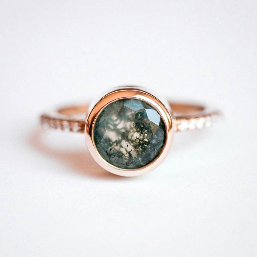 Planet ring set with Moss Agate