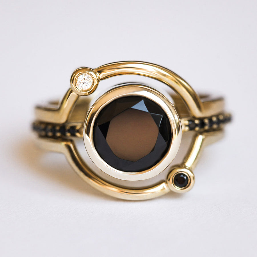 Planet ring set with Black Spinel