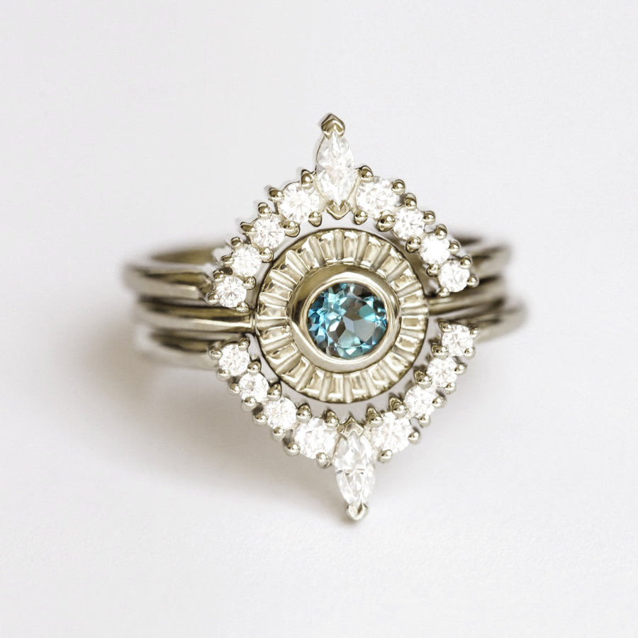 Sunset Ring set with London Blue Topaz and Moissanite