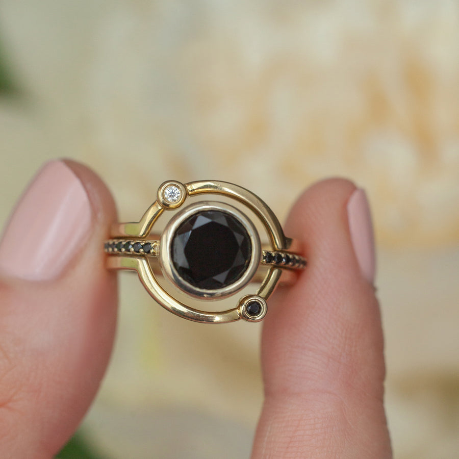 Planet ring set with Black Spinel