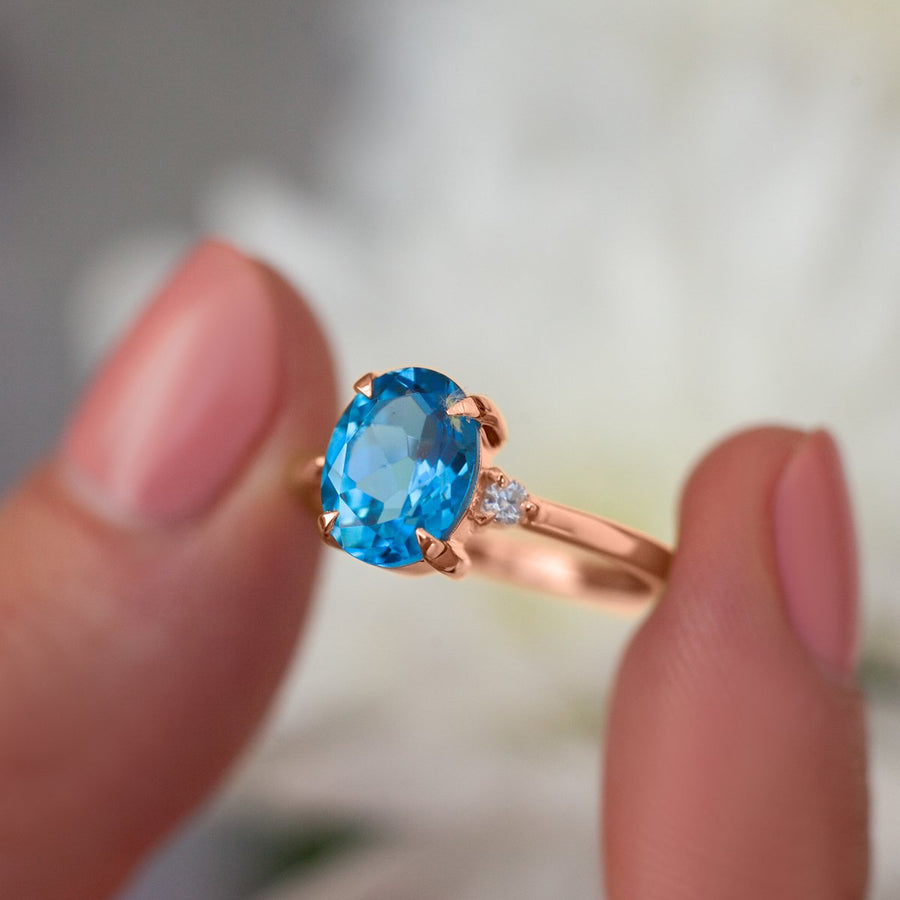 Taylor Oval Swiss Blue Topaz Ring with Moissanite