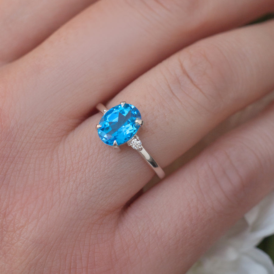 Taylor Oval Swiss Blue Topaz Ring with Moissanite